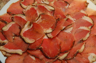 Sliced capicola ready to be served to friends and family.  A Salute!